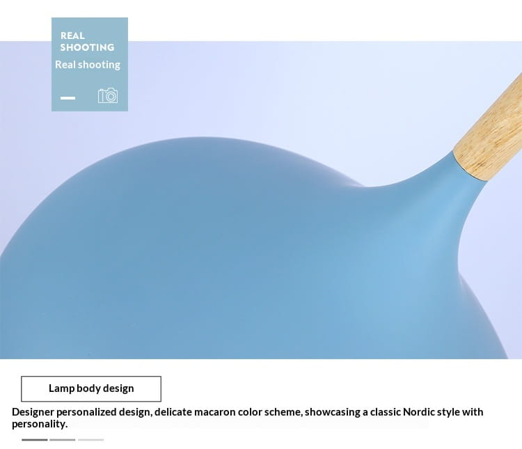 Nordic Macaron led pendant light featuring a soft matte blue shade with a wooden handle and smooth rounded contours.