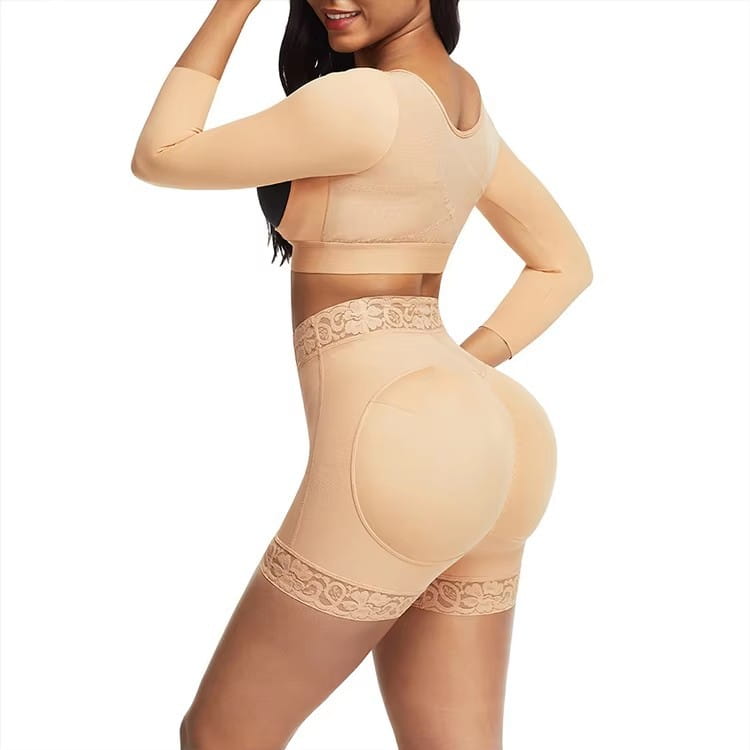 beige two-piece shapewear set with lace trim and padded back shown from the back featuring high waist shapewear shorts with lace butt enhancer detailing