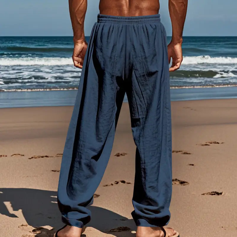 dark blue men’s linen joggers casual drawstring pants featuring loose fit and elastic waistband.