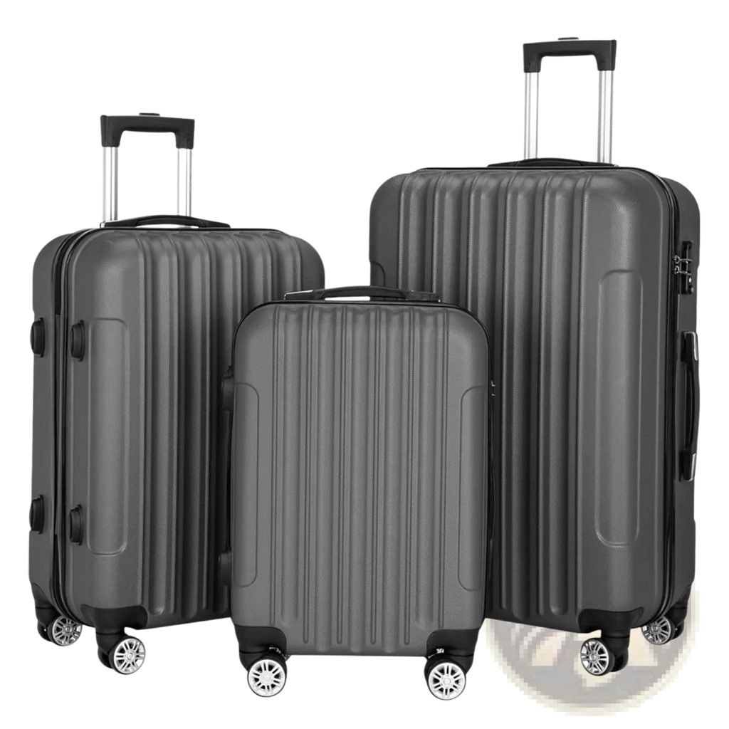 Set of three dark gray hardshell spinner suitcases with vertical ribbed design and black wheels