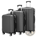 Set of three dark gray hardshell spinner luggage with vertical ridges black handles silver wheels and telescoping handles