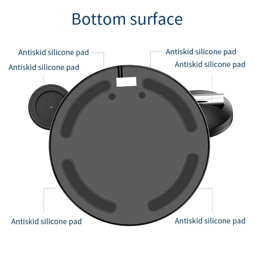 Black circular robot vacuum cleaner with six antiskid silicone pads on bottom featuring 15w output power wireless charging