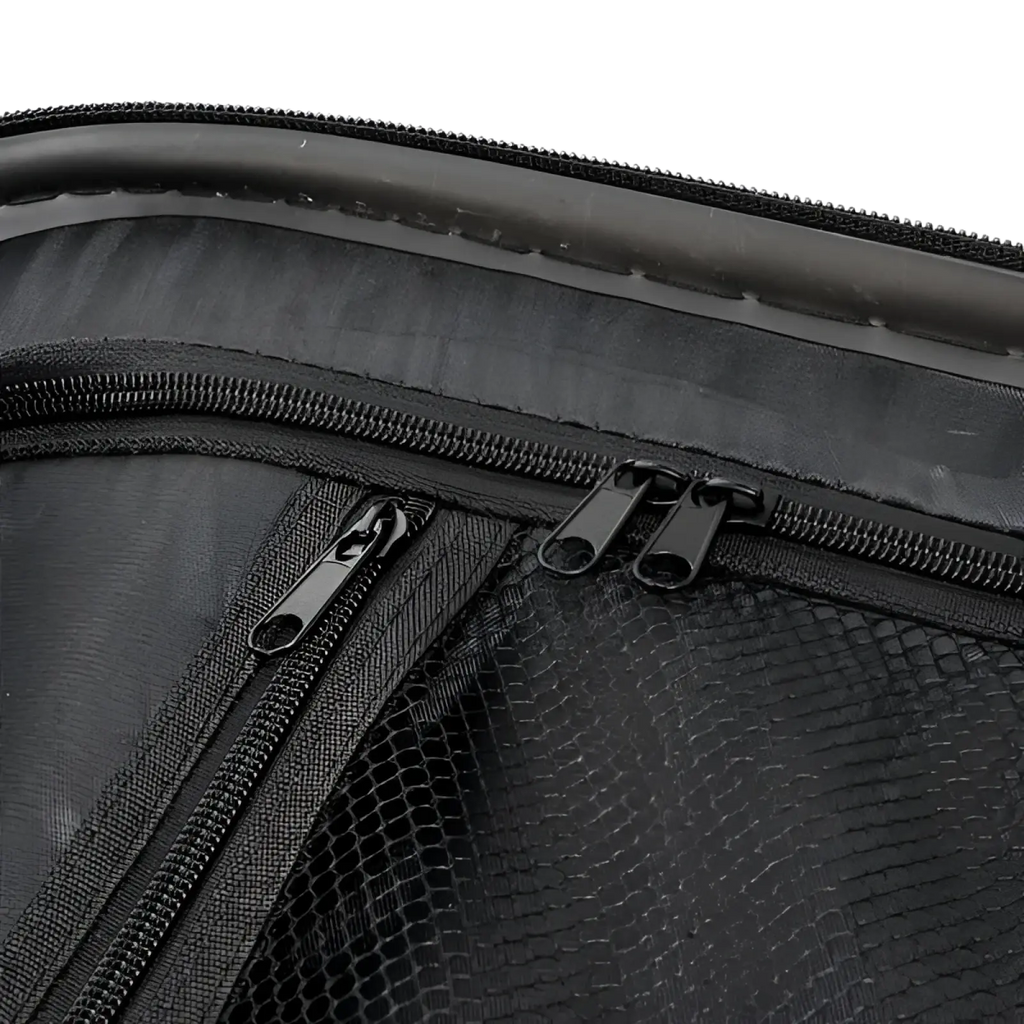Black mesh-lined zipper compartment on durable black fabric of 3-in-1 pink hard shell large capacity suitcase set