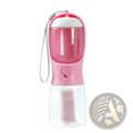 Pink and transparent 3-in-1 portable dog water bottle and food dispenser with white lid, carrying strap, and measurement markings