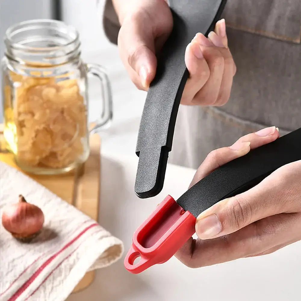 Black and red silicone food sealer with textured grip featured in 3-in-1 silicone slotted spatula and kitchen tongs clip