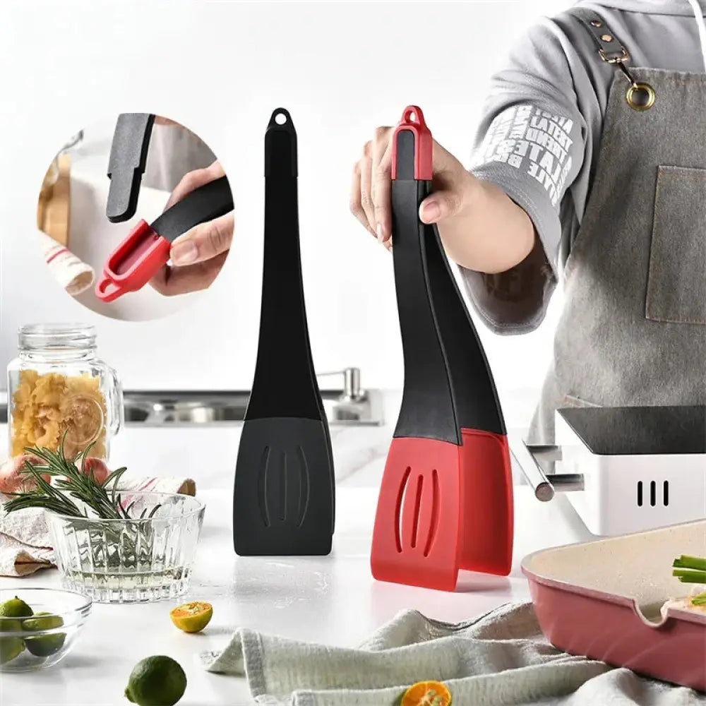 Red and black silicone 3-in-1 slotted spatula with handle loop for kitchen tongs clip use