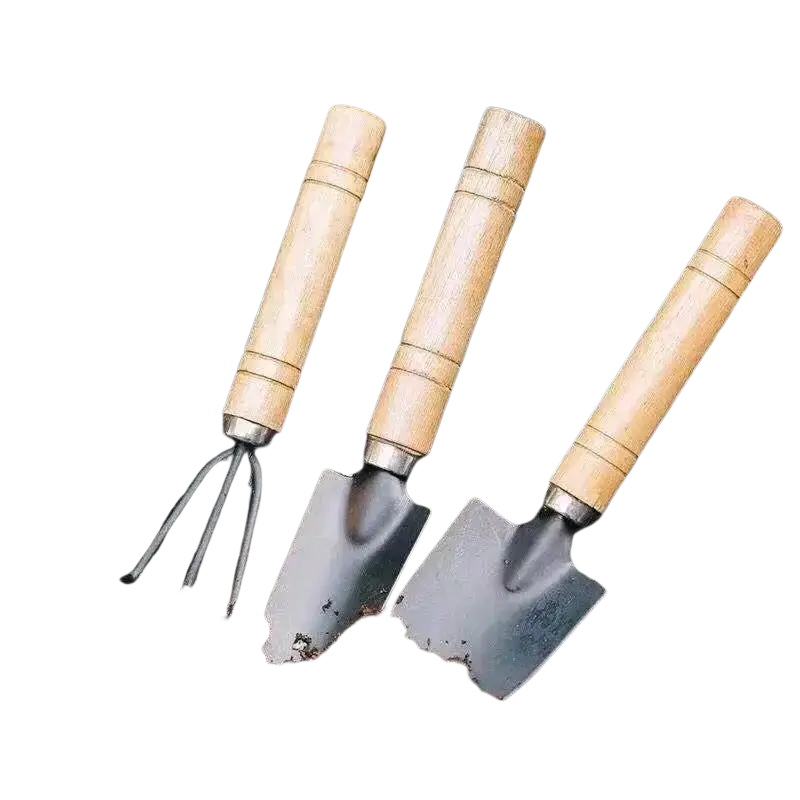 Set of three mini gardening tools with light wood handles and black metal heads including two trowels and a rake