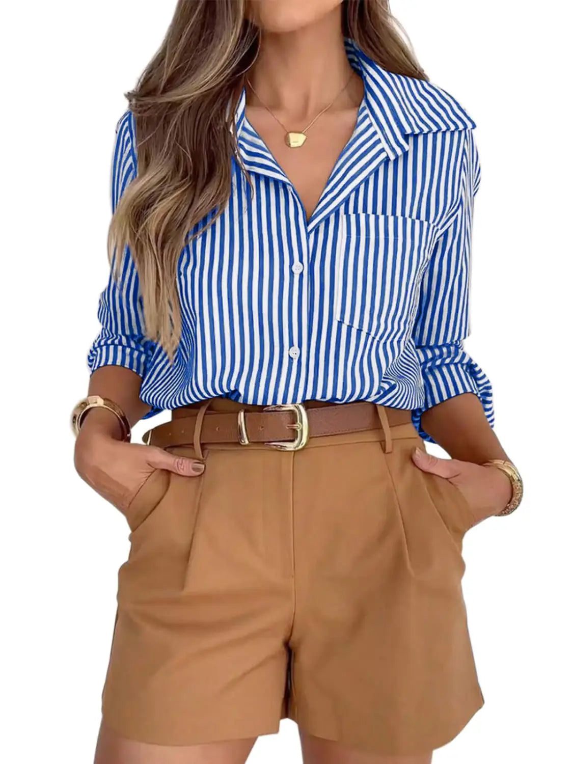 Blue and white vertically striped women’s long sleeve button up shirt dress with rolled sleeves made from lightweight fabric.