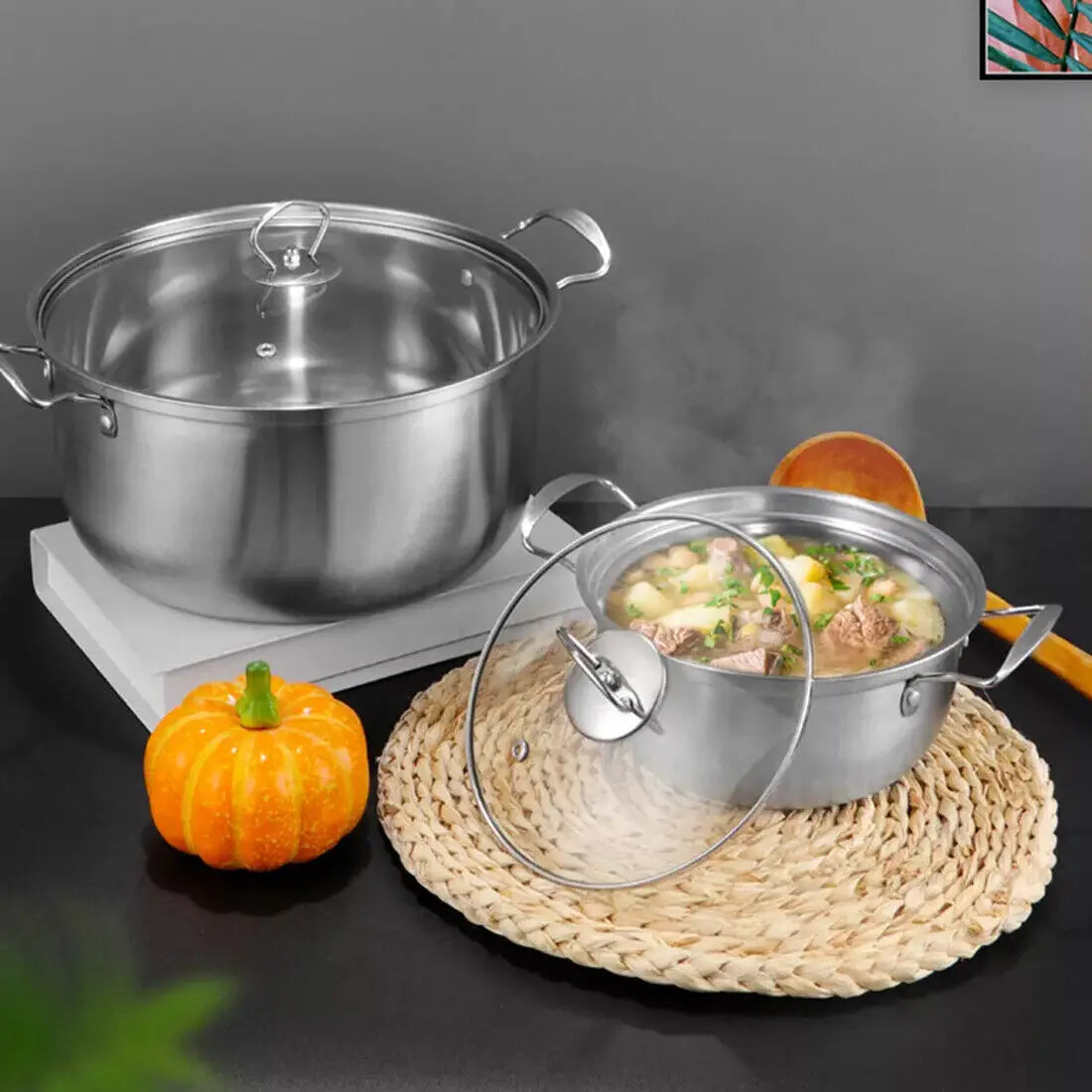 Stainless steel induction cookware set 11 pieces featuring a stainless steel pot with glass lid side handles and a sleek metallic finish.