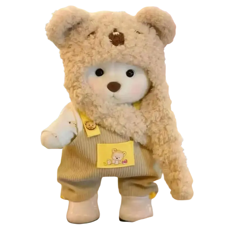 A 30cm nude bear plush in beige wearing fluffy hooded outfit with corduroy overalls and yellow patch details for manual measurement