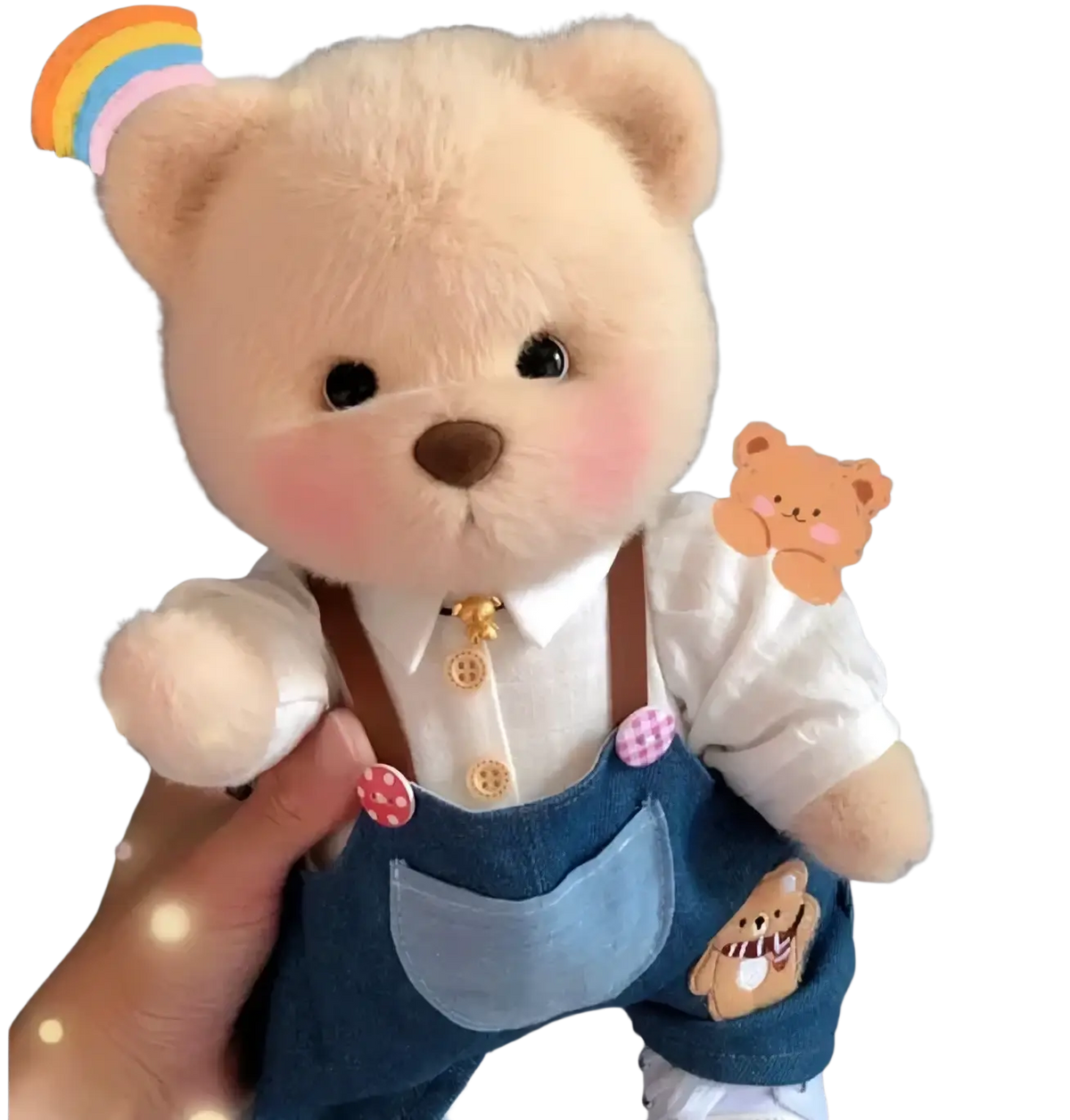 A 30cm nude bear plush in beige dressed in denim overalls with brown straps and white collared shirt for manual measurement