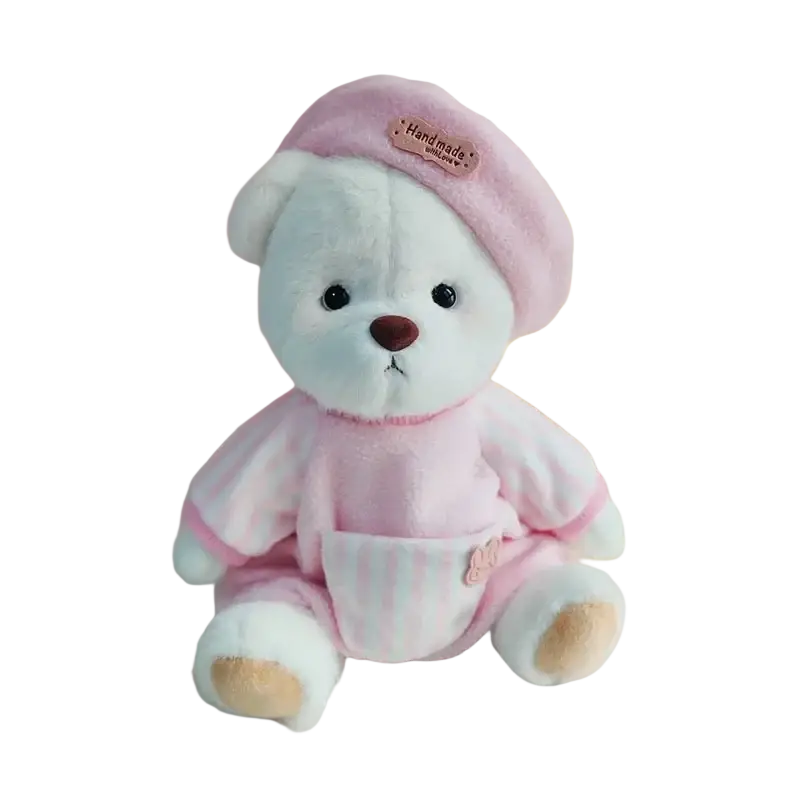 A 30cm nude bear plush with soft white fur wearing a pink velvet hat and striped pajamas with patch embroidery