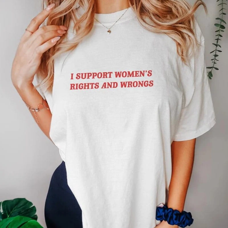 White oversized cotton t-shirt with red text reading i support womens rights and wrongs across the chest.