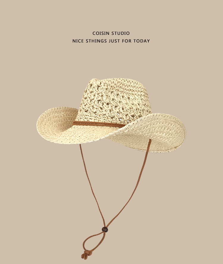 Beige woven straw cowboy hat for men with a brown leather band and adjustable chin strap.