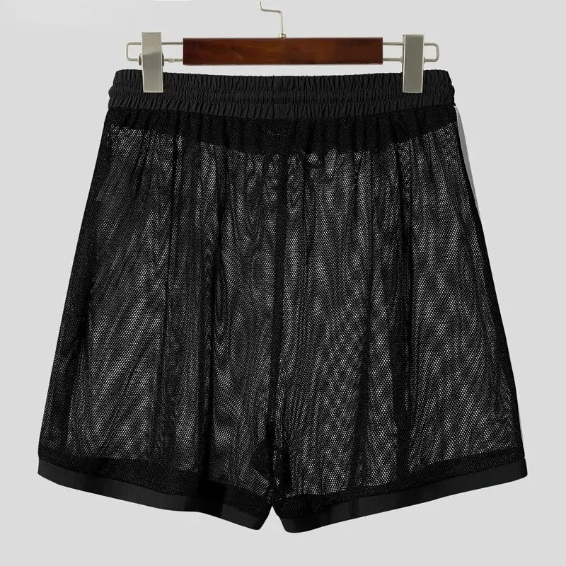 Black mesh men’s quick dry athletic shorts with a stretchy elastic waistband and satin trim along the hem.