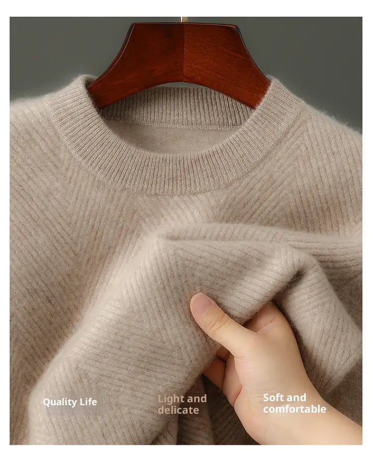 A soft light beige ribbed knit cashmere pullover sweater for men with a cozy crew neck and herringbone pattern.