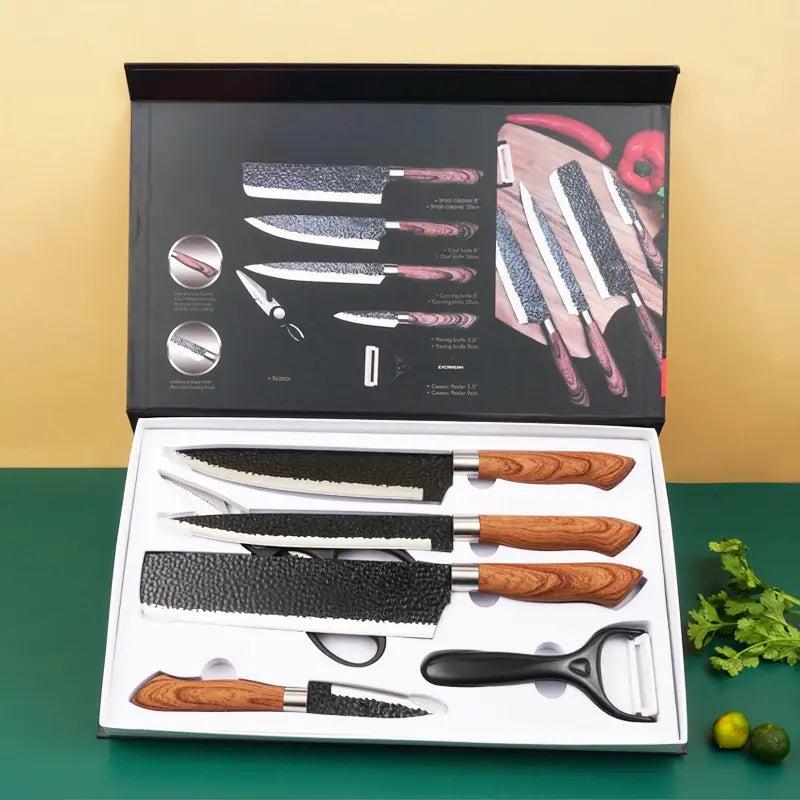 six-piece hammered steel kitchen knife set featuring black textured blades and wooden handles including a chef knife utility knife serrated knife paring knife cleaver and vegetable peeler in a storage case.