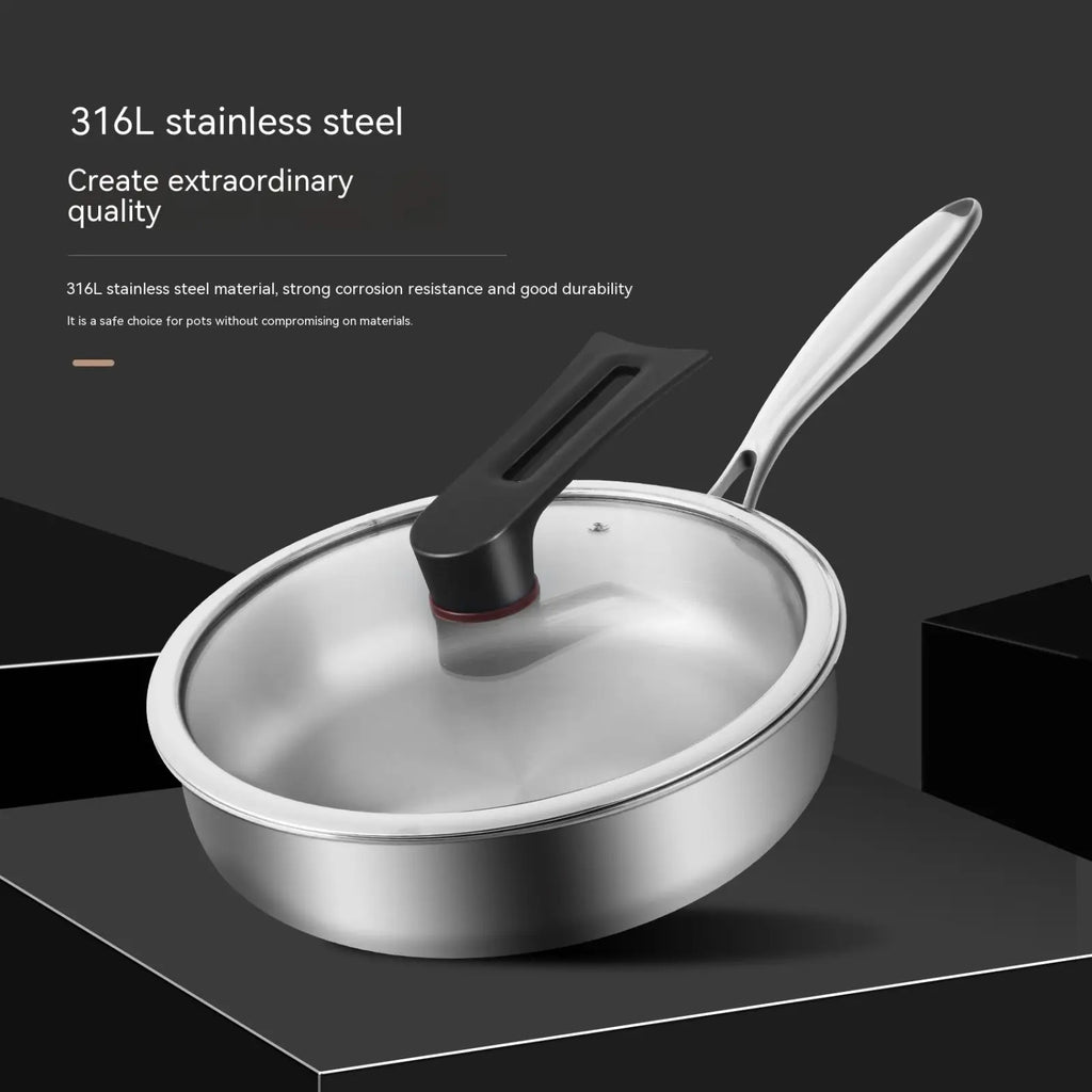 A sleek round 316l stainless steel frying pan with polished body handle and matching glass lid with black knob
