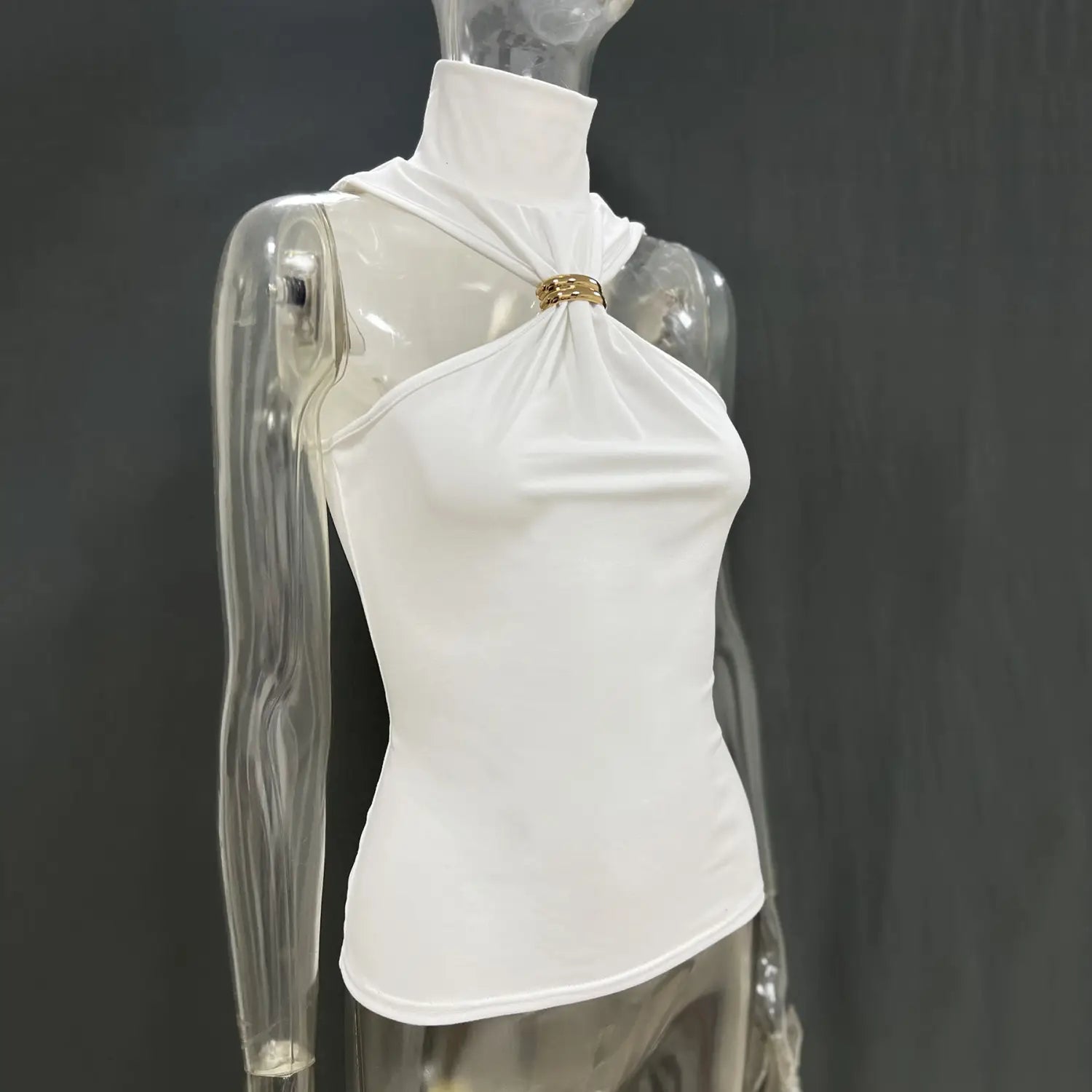 White satin gold ring halter stretch top featuring a gold-toned metallic clasp at the neckline.