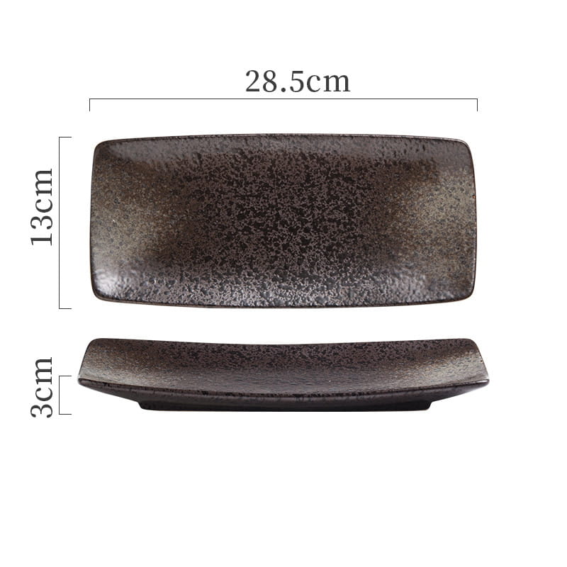 Dark gray speckled ceramic rectangular sushi plate with rounded corners and a slightly raised rim for Japanese ceramic sushi plates rectangular trays.