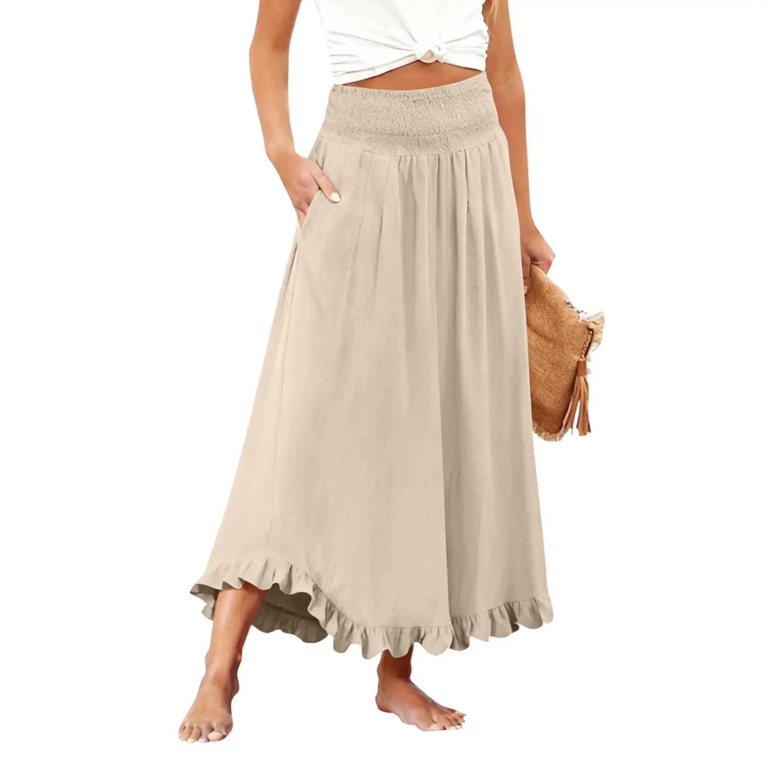 Beige flowy maxi skirt with a smocked waistband and ruffled hem designed as a high waisted ruffled flowy maxi skirt.