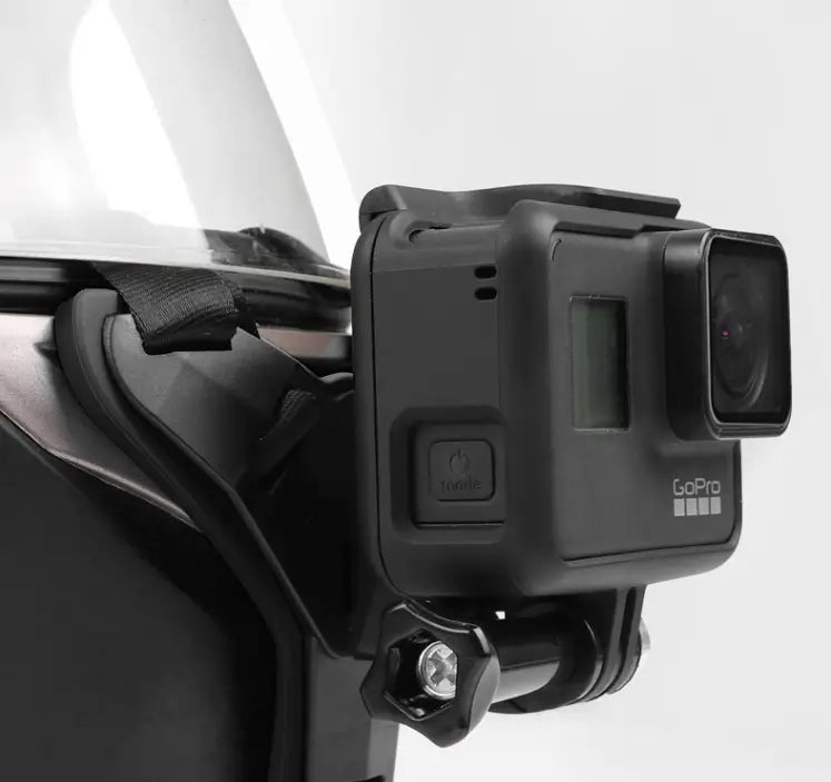 Black GoPro action camera mounted on a helmet using a GoPro helmet chin mount designed for DJI Hero 7 6 5 models.