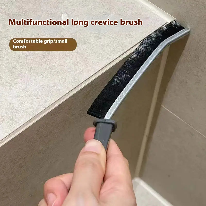 Silver-handled multifunctional long crevice brush with black bristles designed for tight spaces included in a gap cleaning brushes for tile and crevice 5pcs set.