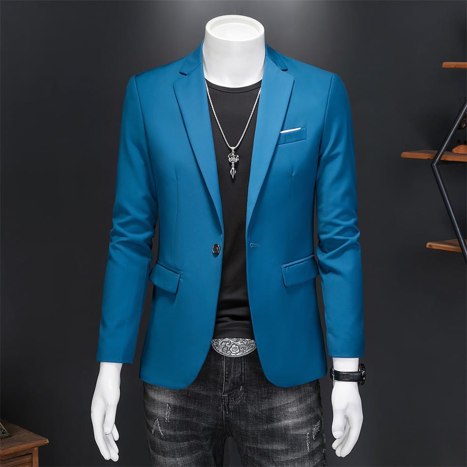 Chaqueta de vestir empresarial de pana azul vibrante con ajuste slim, con cierre de un solo botón y bolsillos con solapa.