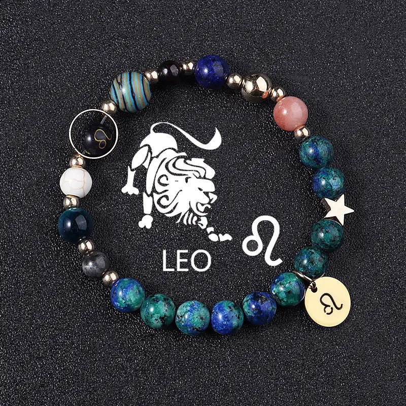 A natural stone zodiac constellation beaded bracelet featuring vibrant blue and green beads with silver accents and a leo zodiac charm alongside a circular pendant engraved with the leo symbol.