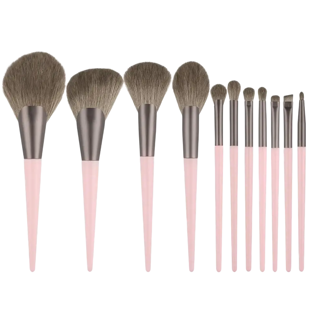 Set of 12 pink-handled makeup brushes with silver ferrules and nylon brush material in a 33-piece makeup brush and sponge set