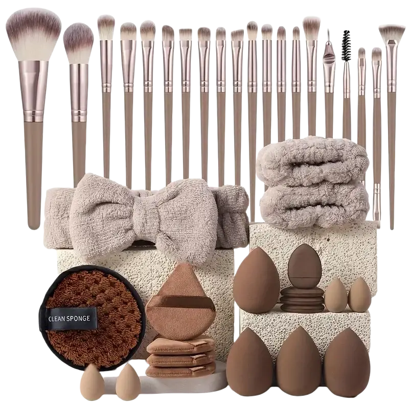A 33-piece makeup brush and sponge set with nylon bristles rose gold ferrules taupe handles and beauty tools