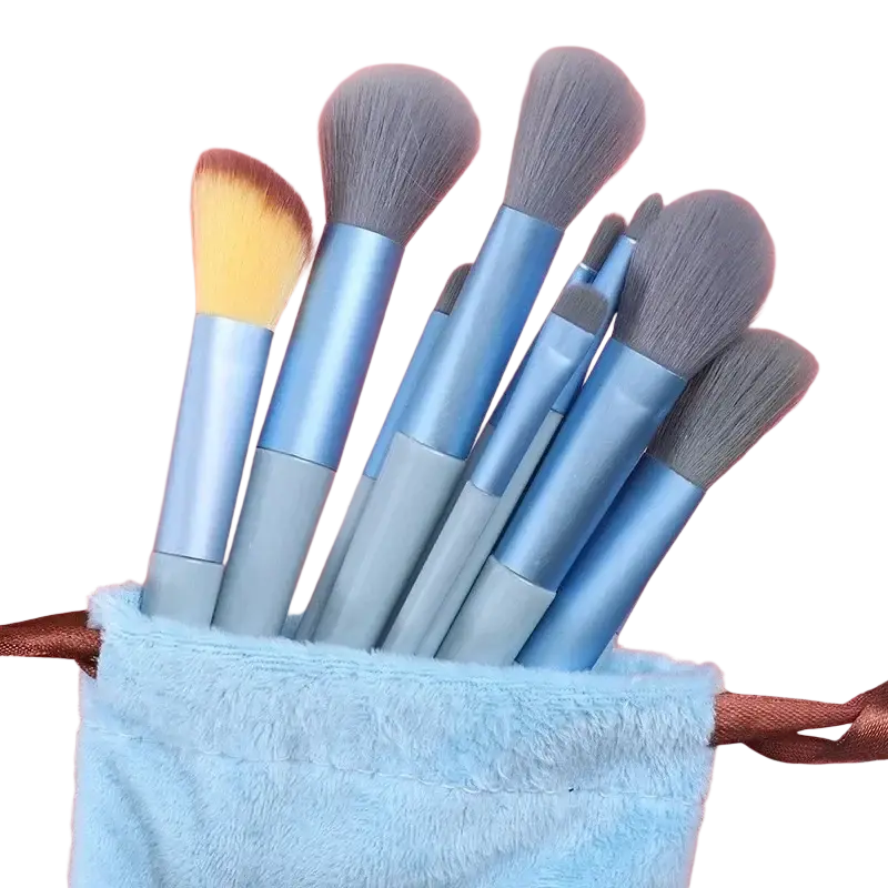 Set of ten blue-handled makeup brushes with nylon bristle material in a light blue plush pouch from 33-piece set
