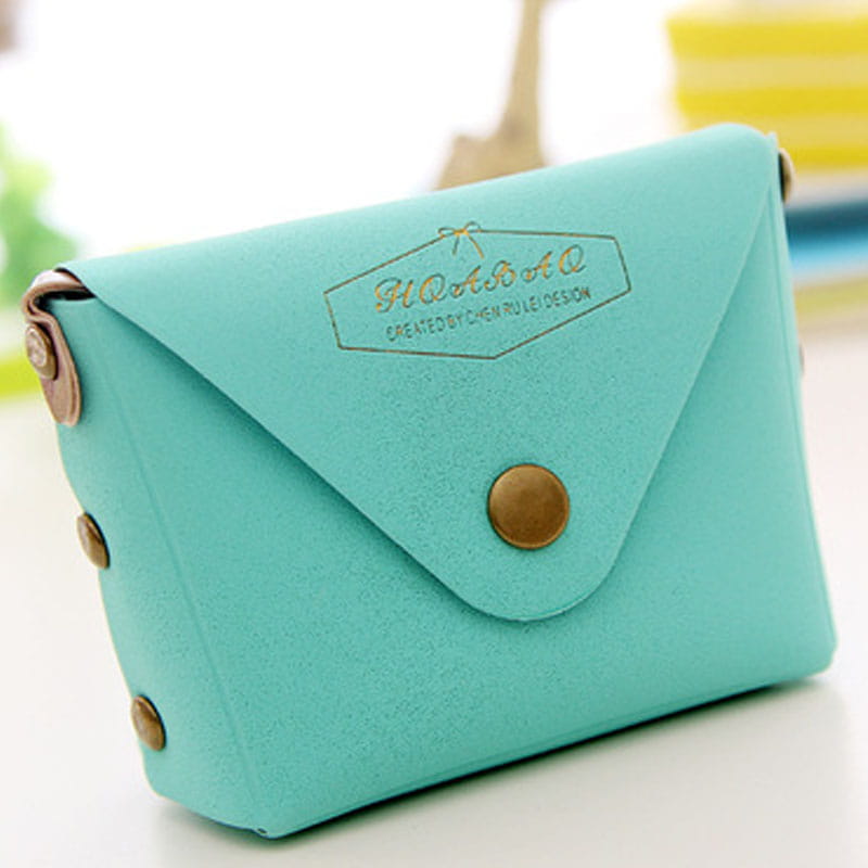 A mint green leather and PVC envelope-style coin purse with gold-tone metal accents and a branded logo on the flap from the macaron pastel coin purse set.
