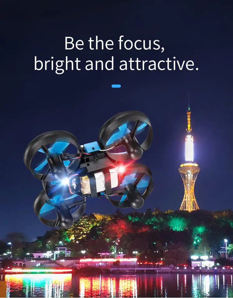 Dron planeador volador RC 3 en 1 iluminado de color negro y azul, con luces rojas luminosas para uso en tierra, agua y aire.