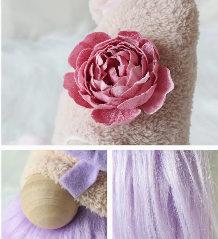 A plush lavender and pink plush gnome doll desktop ornament featuring a velvety pink rose on its head and wooden details.