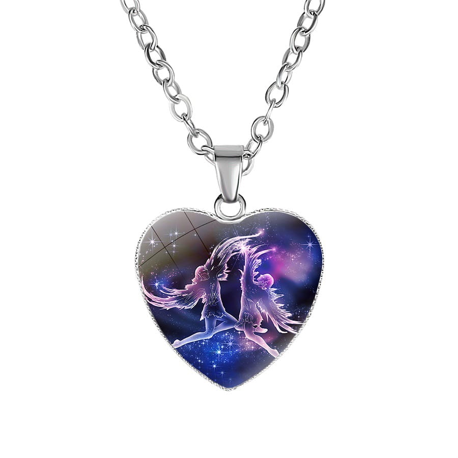 Silver heart-shaped pendant necklace with a vibrant cosmic design featuring two winged figures against a starry purple and blue galaxy backdrop in the zodiac celestial heart pendant galaxy constellation necklace.