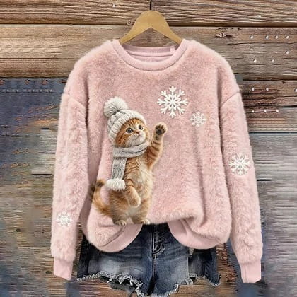 Fluffiger rosa bestickter Tier-Weihnachts-Crewneck-Pullover mit einem verspielten orangefarbenen Kätzchen, das eine Strickmütze und einen Schal mit weißen Schneeflockenmustern trägt.