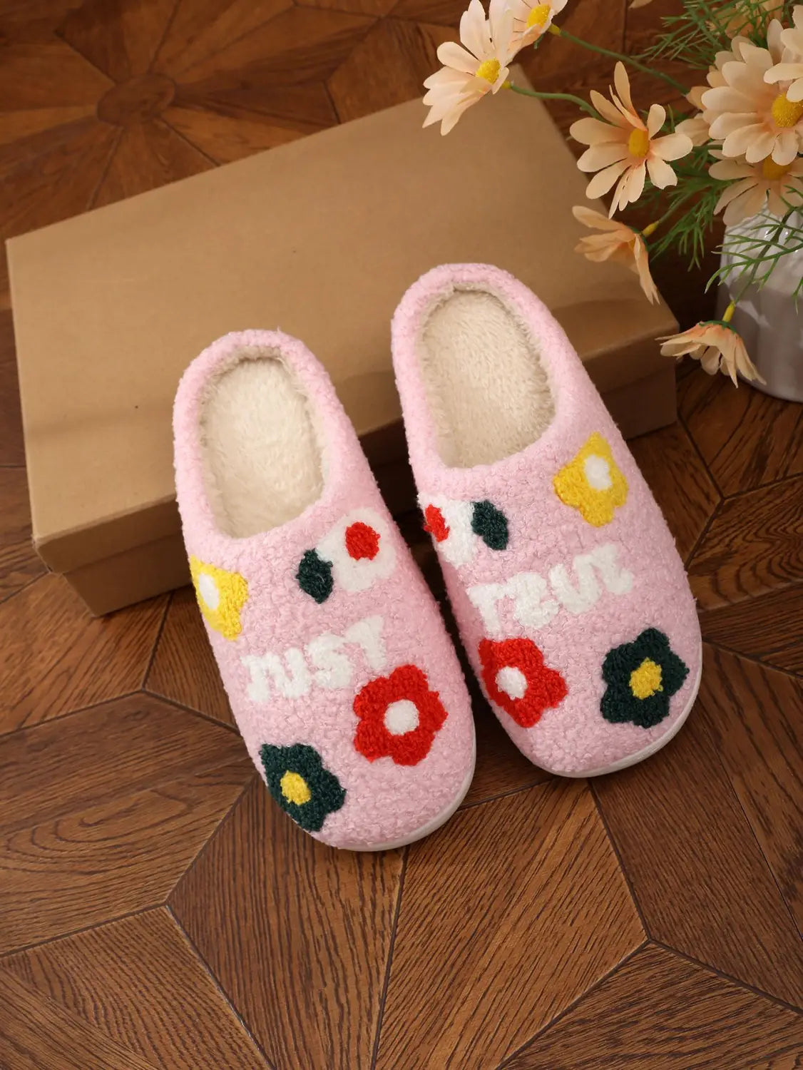 plush floral cotton slippers in pink with colorful embroidered flowers and white just lettering featuring soft tpr sole for indoor comfort