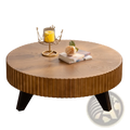 Round retro coffee table with a fluted light brown wooden top and dark wooden legs for living room use