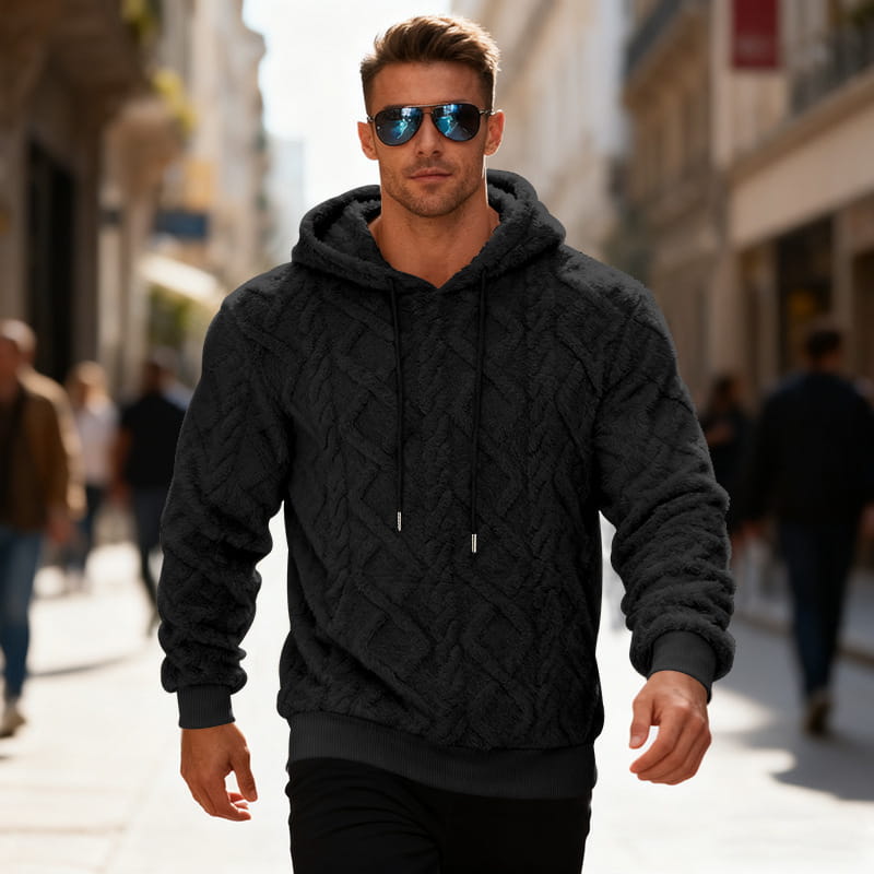 Men’s textured fleece lined black cable knit hooded sweatshirt with drawstrings and ribbed cuffs designed for warmth and comfort.