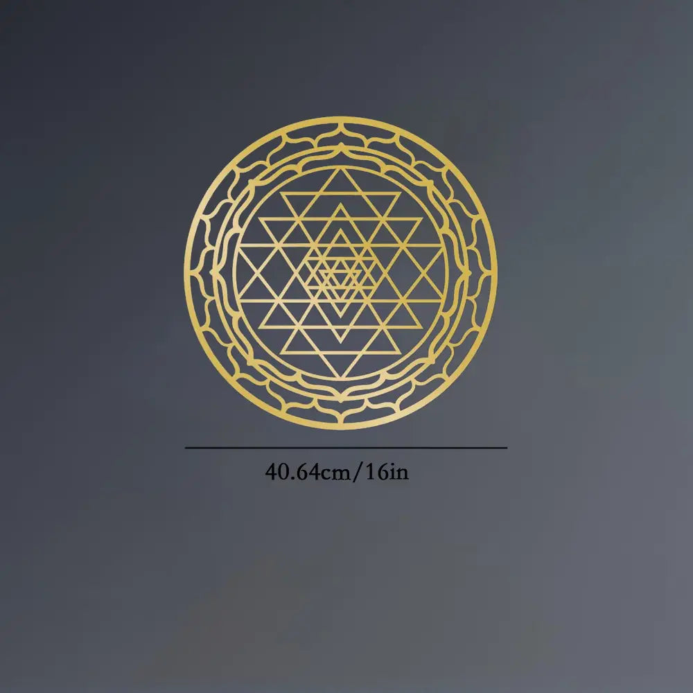 Golden sri yantra metal wall art decor featuring an intricate geometric design in sacred geometry style