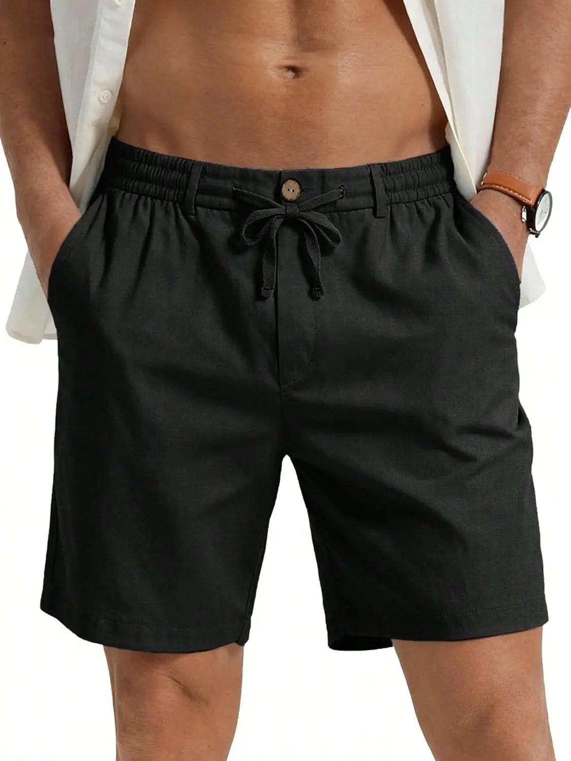 Schwarze lässige Sport-Shorts mit Kordelzug mit lockerer Passform und elastischem Bund, entworfen für bequeme Activewear.