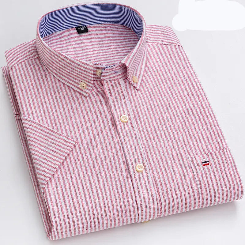 Men’s premium 100 percent cotton textured short sleeve shirt featuring pink and white vertical stripes with a blue and white striped inner collar lining.
