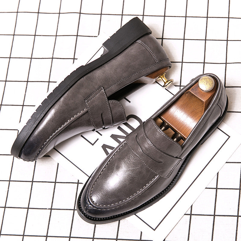 Men’s British style dark gray microfiber suede loafers with classic slip-on design and black rubber soles