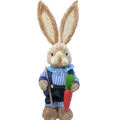 A 35cm rustic straw easter rabbit figurine in blue and white striped overalls holding a shovel and a red carrot