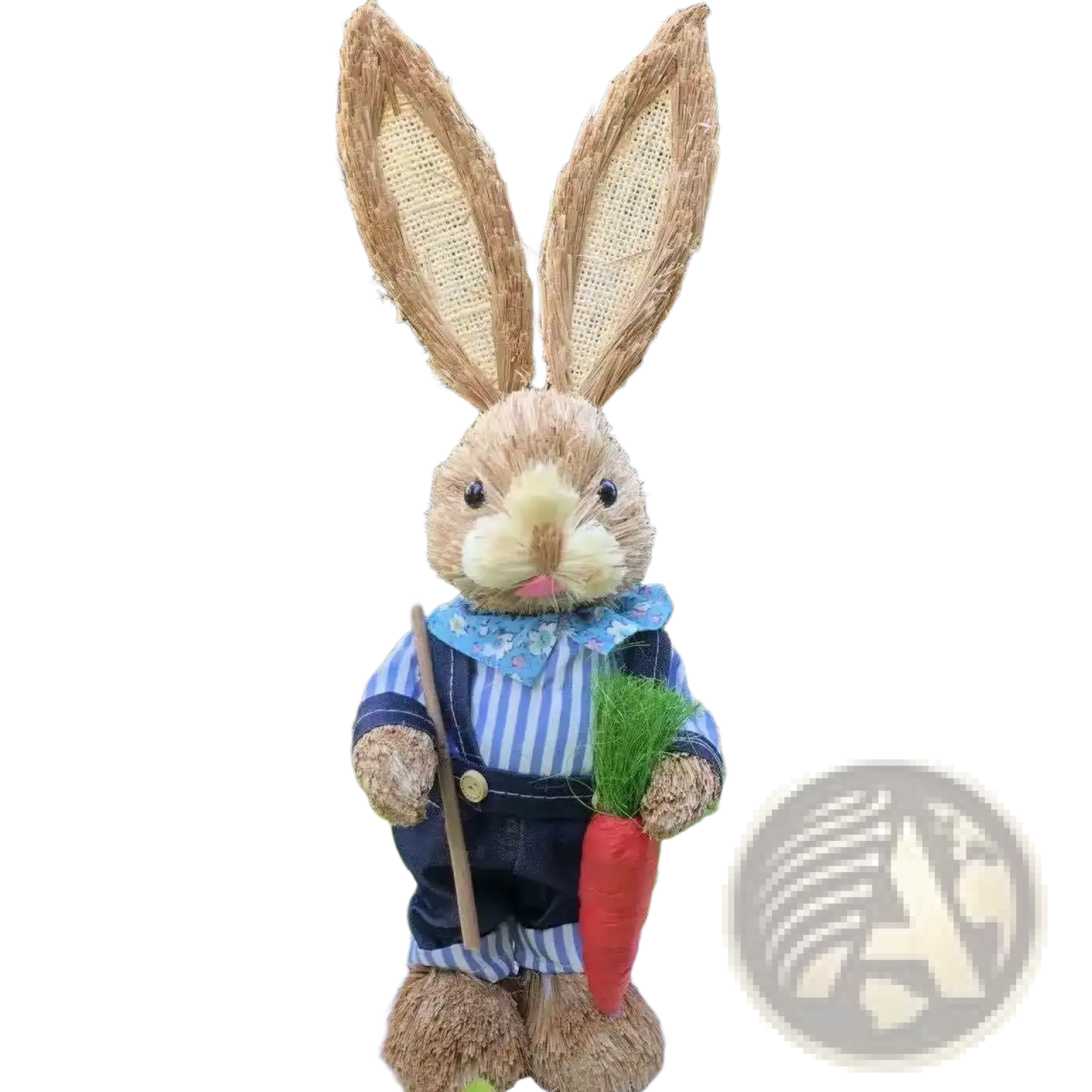 A 35cm rustic straw easter rabbit figurine in blue and white striped overalls holding a shovel and a red carrot