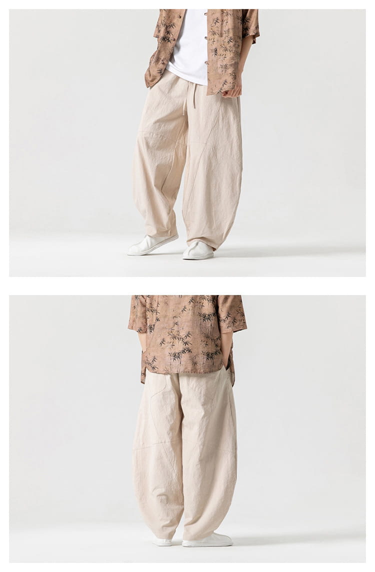 Pantalon ample beige en lin de Tai Chi, coupe ample et fluide, avec détails de couture verticale discrets, pour un port décontracté.