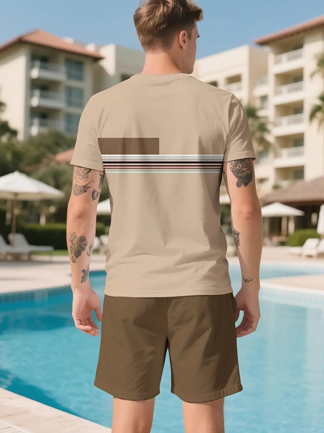 Back side of a beige short-sleeved t-shirt with a horizontal striped band across the back from the men striped athletic short set.