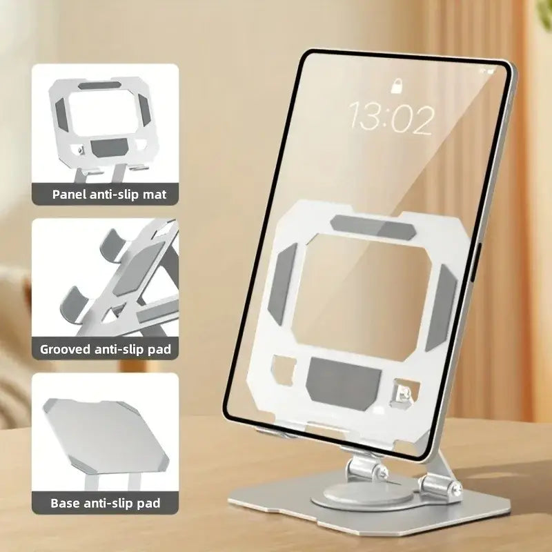 Silver metal 360 rotating adjustable tablet stand with sleek angular design and anti-slip pads for secure support