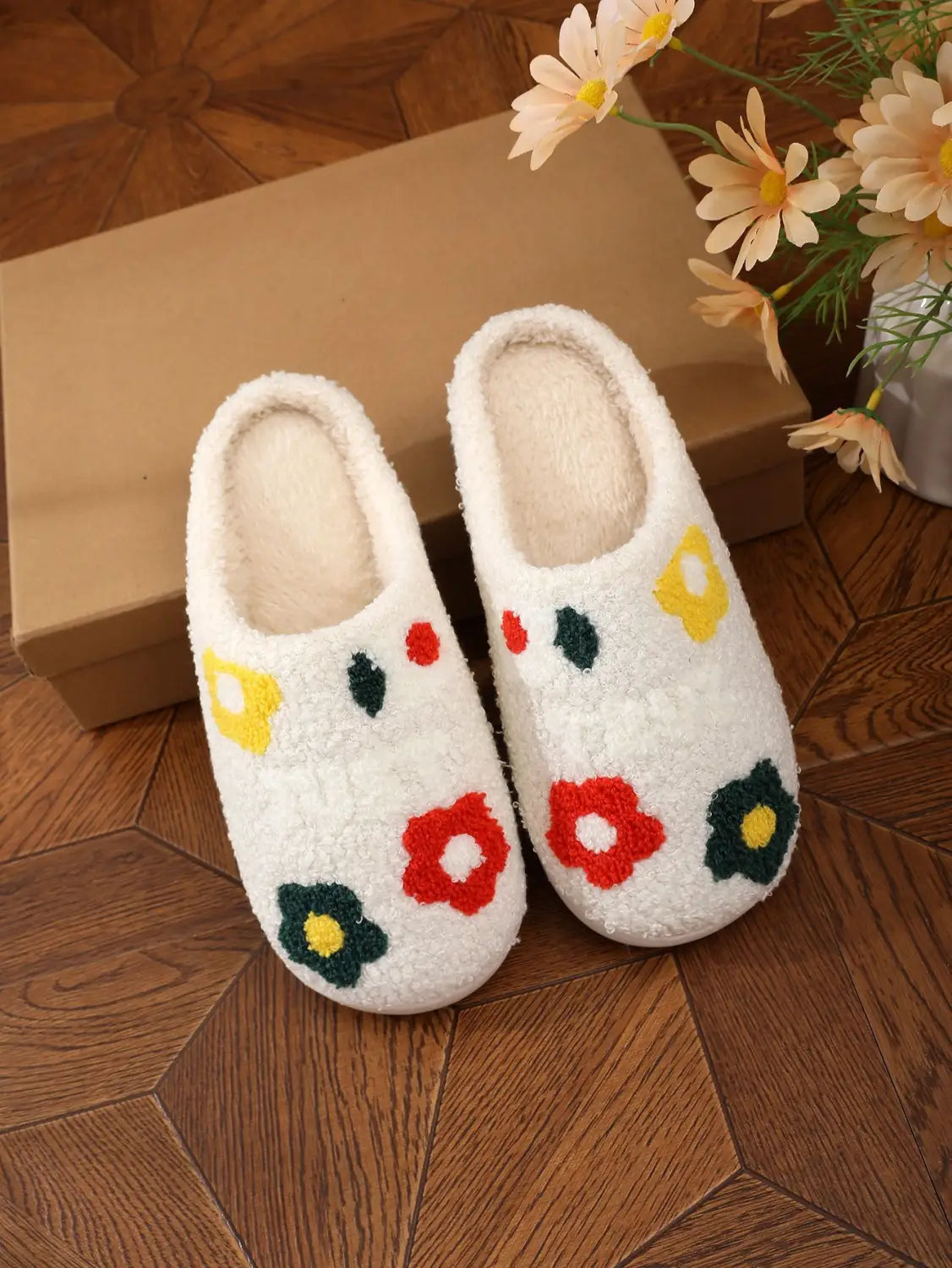 White fuzzy plush floral cotton slippers with soft TPR sole featuring colorful embroidered flowers in red yellow and green.